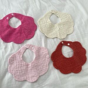 Girl flower bibs. Set of 7